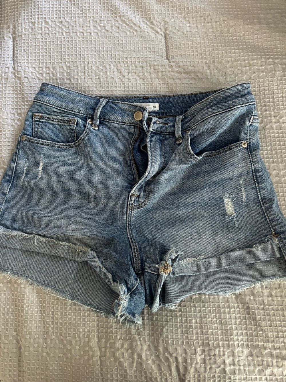 Good American Light Blue Distressed High-Rise Jean Shorts
